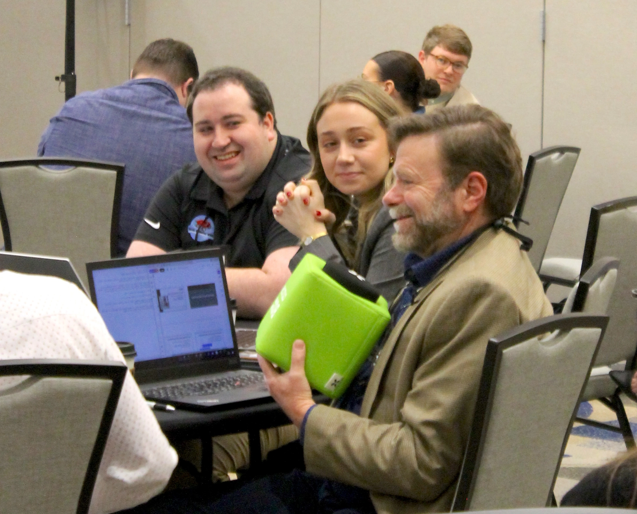 A law firm team attending the Summit together