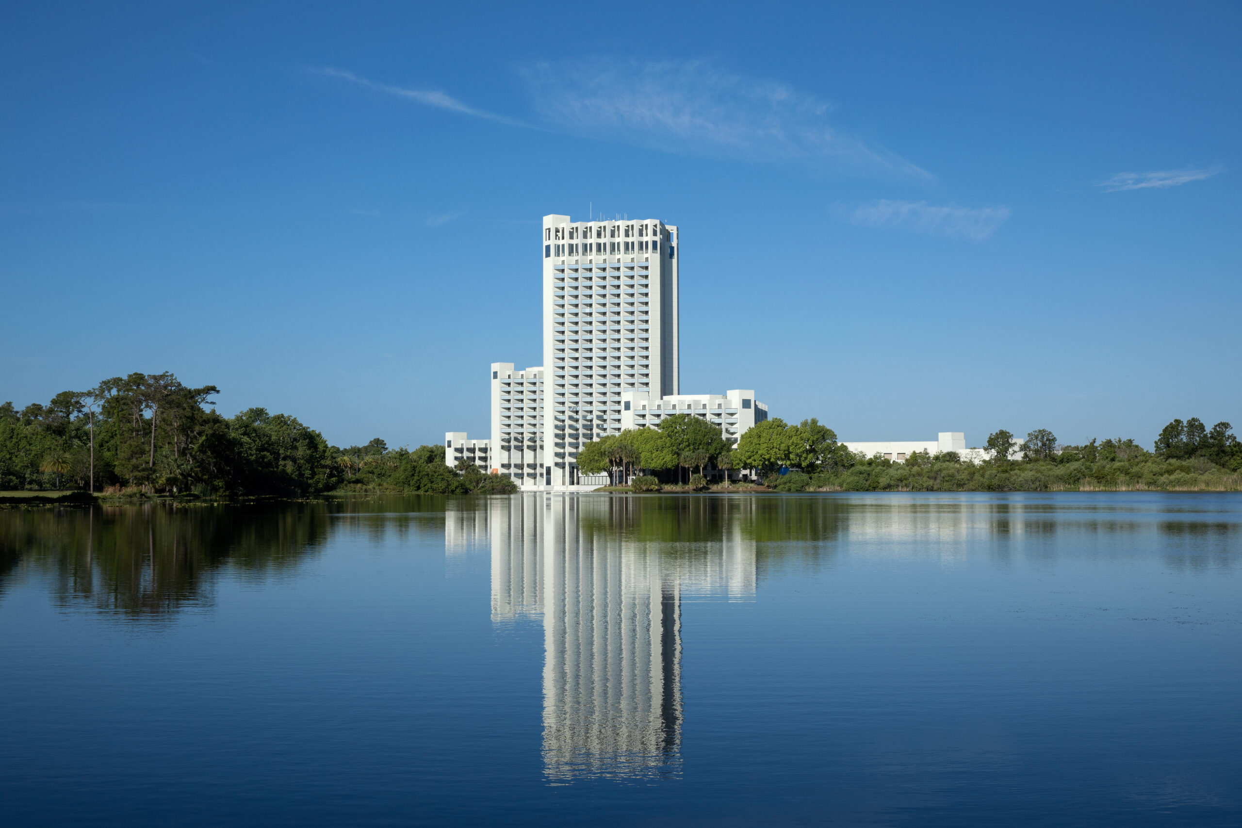 Hilton Orlando Lake Buena Vista Palace exterior overlooking the lake