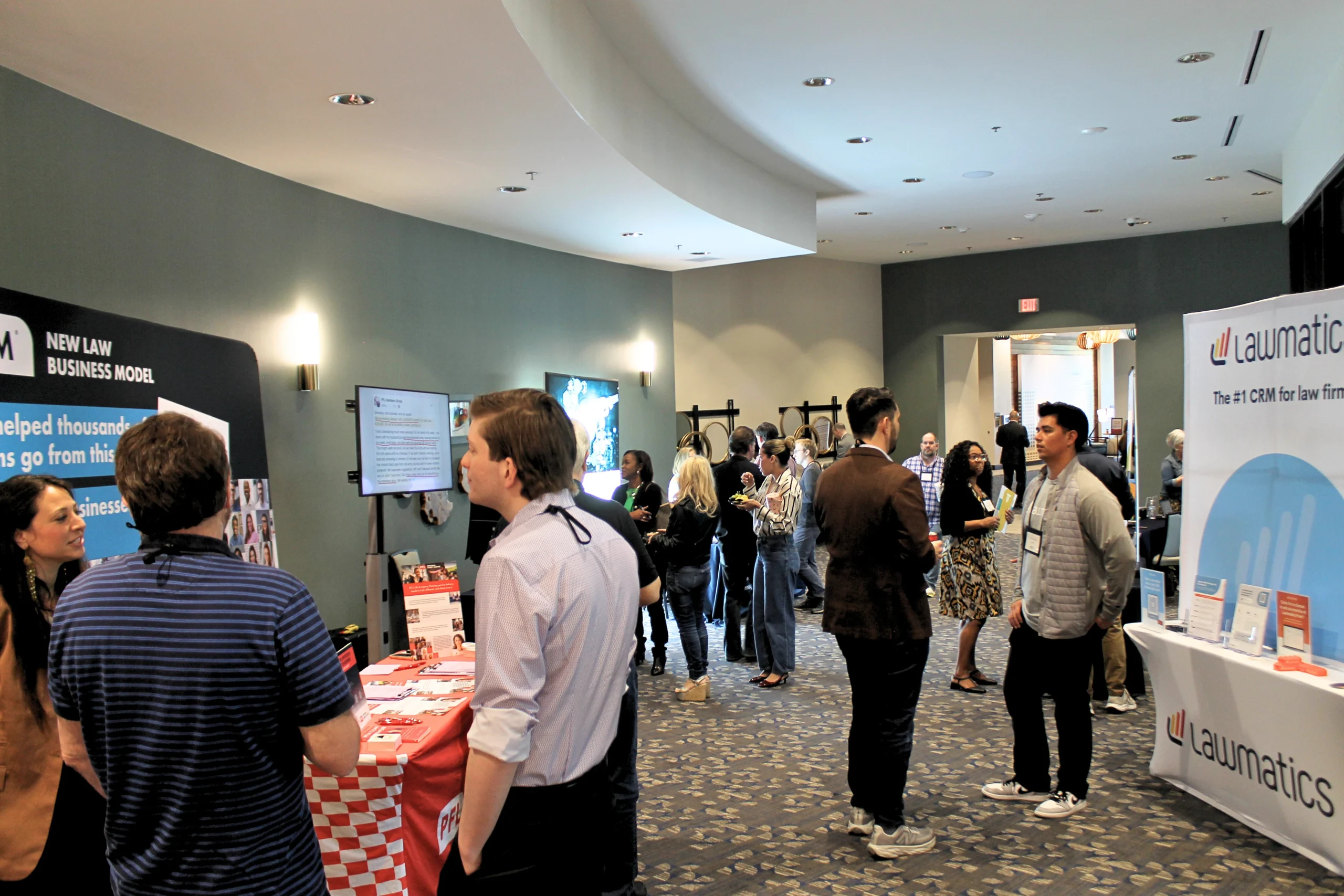Sponsors at their exhibit tables during the Summit